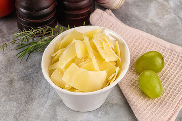 Parmesan cheese slices in the bowl