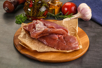 Raw uncooked turkey thigh fillet