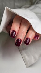 The beauty of the natural nails. Perfect clean manicure. New trendy nail arts on young women hand. Beautiful nail polish in hand. snake manicure