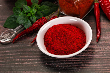 Spicy dry paprika powder in the bowl