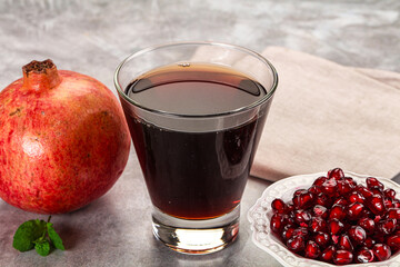 Sweet fresh pomegranate juice with fruit