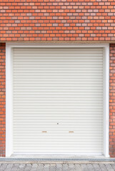 Closed steel shutter door of warehouse, storage or storefront for metal door background and textured.