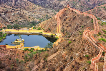 Defensive wall and water reservoir of Jaigarh Fort on Aravalli Hills near Jaipur, Rajasthan, India