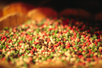 Peppercorn. Food Spices Mix Colorful Peppercorns. Mixed Pepper Dry Berries. Concept of Fresh Spices for Cooking Products. Rotation. Close Up, Macro. Full Frame Border. Pepper Pouring from Wooden Spoon