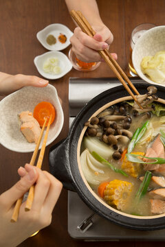 Eating around Hokkaido-style Ishikari nabe