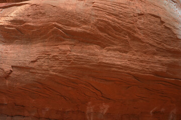 Brown stone rock texture background. Mountains surface. Close-up. Cracked broken crumbled.