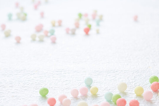 Scattered hina-arare on washi paper
