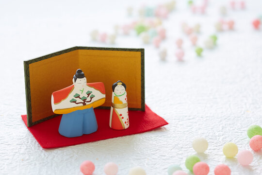 Hina-arare and hina dolls on washi