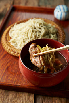 Photograph of the process of making duck seiro soba