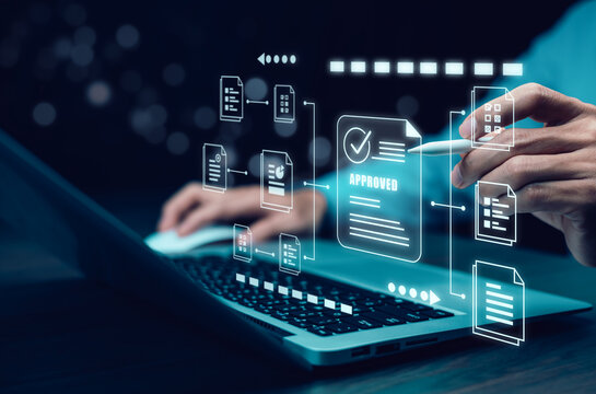 Businessman touching on document for online approve paperless quality assurance and ERP management concept.E-document management, online documentation database, paperless office concept