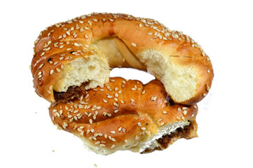 soft and chewy date filled Ajwa Agwa bun, golden brown glaze dessert baked and covered with sesame seeds and stuffed with dates fruit and baked in the oven, a popular traditional pastry and bakery