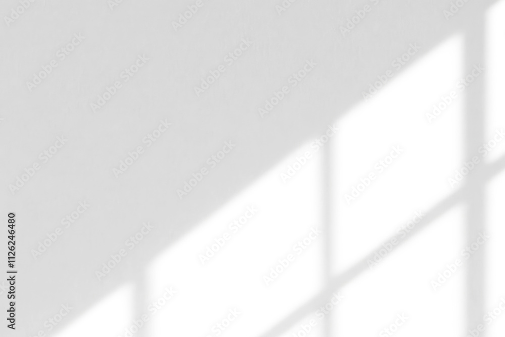 Poster a minimalist image with soft, diffused light casting geometric shadows through a window onto a bare 