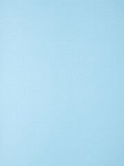 Close up of serene blue paper with subtle texture, gentle