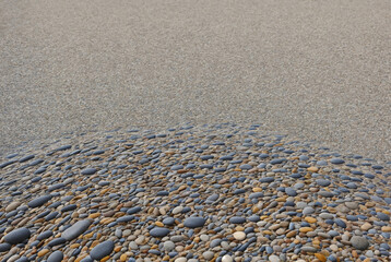 Smooth marine multicolored stones. Pebbles. Background of stones