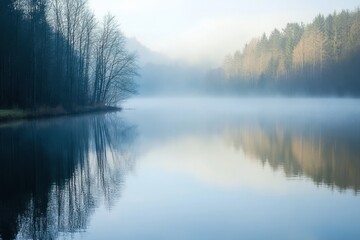 Fototapeta premium Morning mist over a tranquil lake capturing the essence of moisture in nature's calm environment at dawn inviting reflection and peaceful serenity for nature lovers