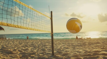 Volleyball ball flying over net on beach at sunset with ocean in background