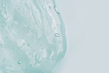 Transparent Skin care Product on Blue Background