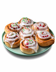 Sweet Cinnamon Rolls with Icing and Sprinkles on a Plate
