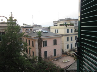 View from the window of a pink house in Rome