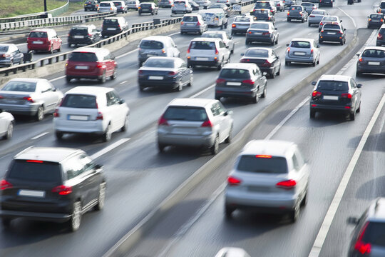 Heavy traffic on a busy highway during afternoon rush hour