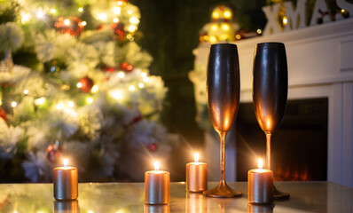 champagne glasses and holiday lights New Year background
