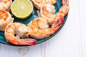 Grilled Tiger shrimps with lime photography . Top view
