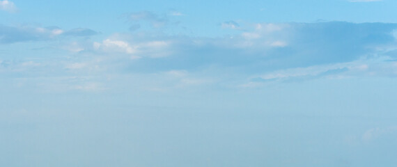 Expansive Blue Sky with Soft Clouds Perfect for Tranquil Settings