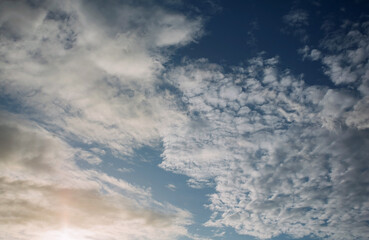 The sky has white clouds in summer.