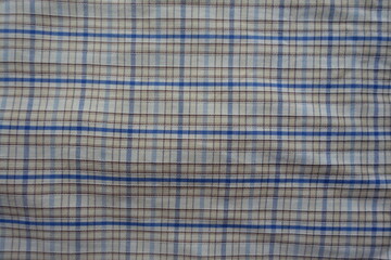 Background - white, blue and brown checkered cotton fabric