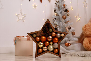 
New Year's star decorated with Christmas balls. Decor. Christmas. Close-up. Copyspace