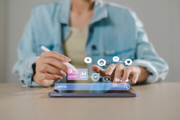 Businessman using hand touching on digital tablet to use marketing tools and check research visits...