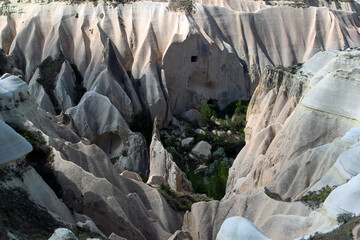 Cappadocia is a semi-desert region in central Turkey. It is famous for its fairy chimneys - tall...