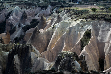 Cappadocia is a semi-desert region in central Turkey. It is famous for its fairy chimneys - tall...