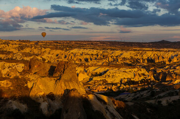 Cappadocia is a semi-desert region in central Turkey. It is famous for its fairy chimneys - tall...