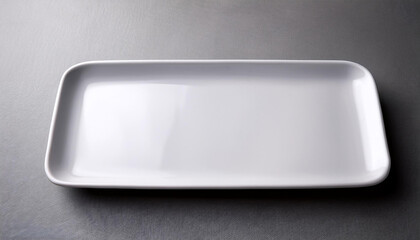 empty rectangular Plate on gray table background.