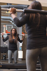woman exercising in gym