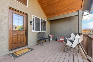 Tranquil porch space with inviting seating and scenic views in a serene neighborhood