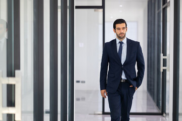 Fototapeta premium Portrait of Confident successful business people woking in office. rich confident business man owner in office.