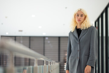 Fototapeta premium Portrait of smiling business woman. Confident successful business female people wear casual classic jacket woking in office