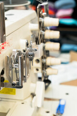 Sewing machine in action at a textile workshop during the day