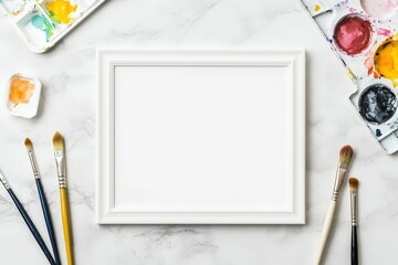 A blank canvas surrounded by paintbrushes and watercolor palettes, ideal for artistic creativity and painting projects.