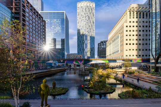 Morning sunrise view of the inner Dock of Canary Wharf London with the newly redecorated Eden Project