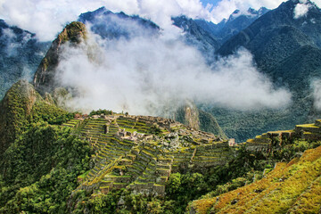 Inca citadel Machu Picchu with morning fog, Peru
