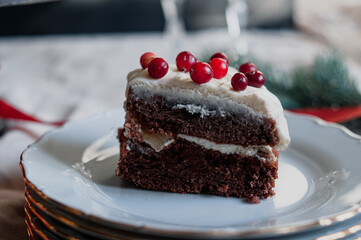 Delicious ready to eat wreath Christmas cake decorated with fresh cranberries and cream cheese frosting with festive styling