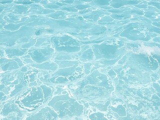 Obraz premium Beautiful water waves with splashes in clear blue water, summer