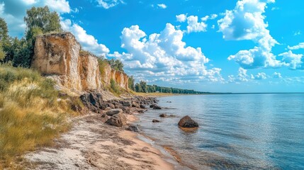 Serene beach landscape featuring cliffs and large stones with clear water promoting family holidays and environmental protection awareness.