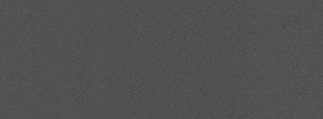 Dark, grainy backdrop with scattered light spots creating a gradient transition for a dramatic and elegant design