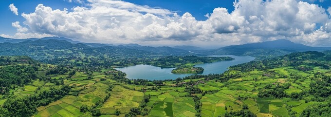 A beautiful landscape with a large lake and mountains in the background