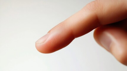 Detailed close-up of a finger poised to press the enter key on a keyboard symbolizing action and decision-making in digital communication.