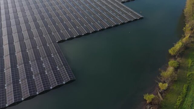 Floating Solar Panels Of Holemans - Kieswerk Ellerdonk In Wesel, Germany. Aerial Drone Shot